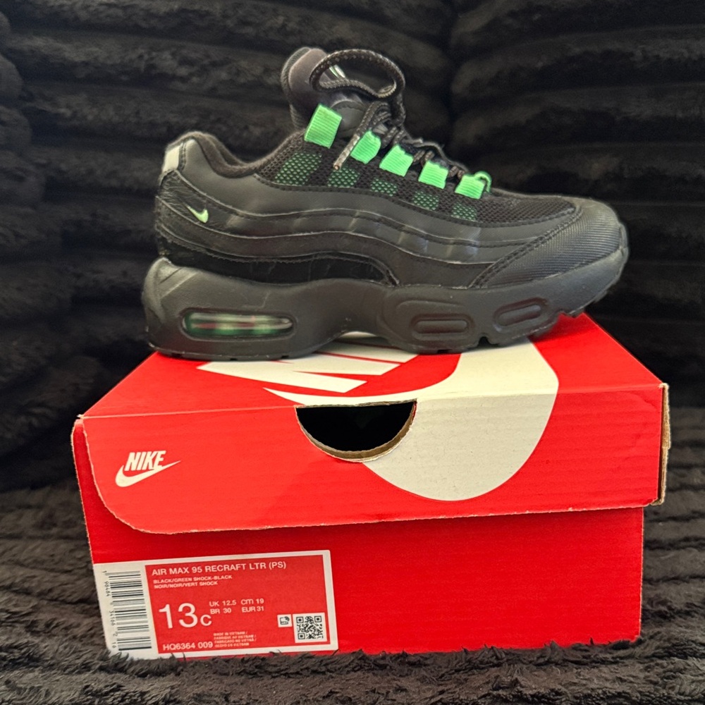 Nike Kids Black Sneakers with Green Accents